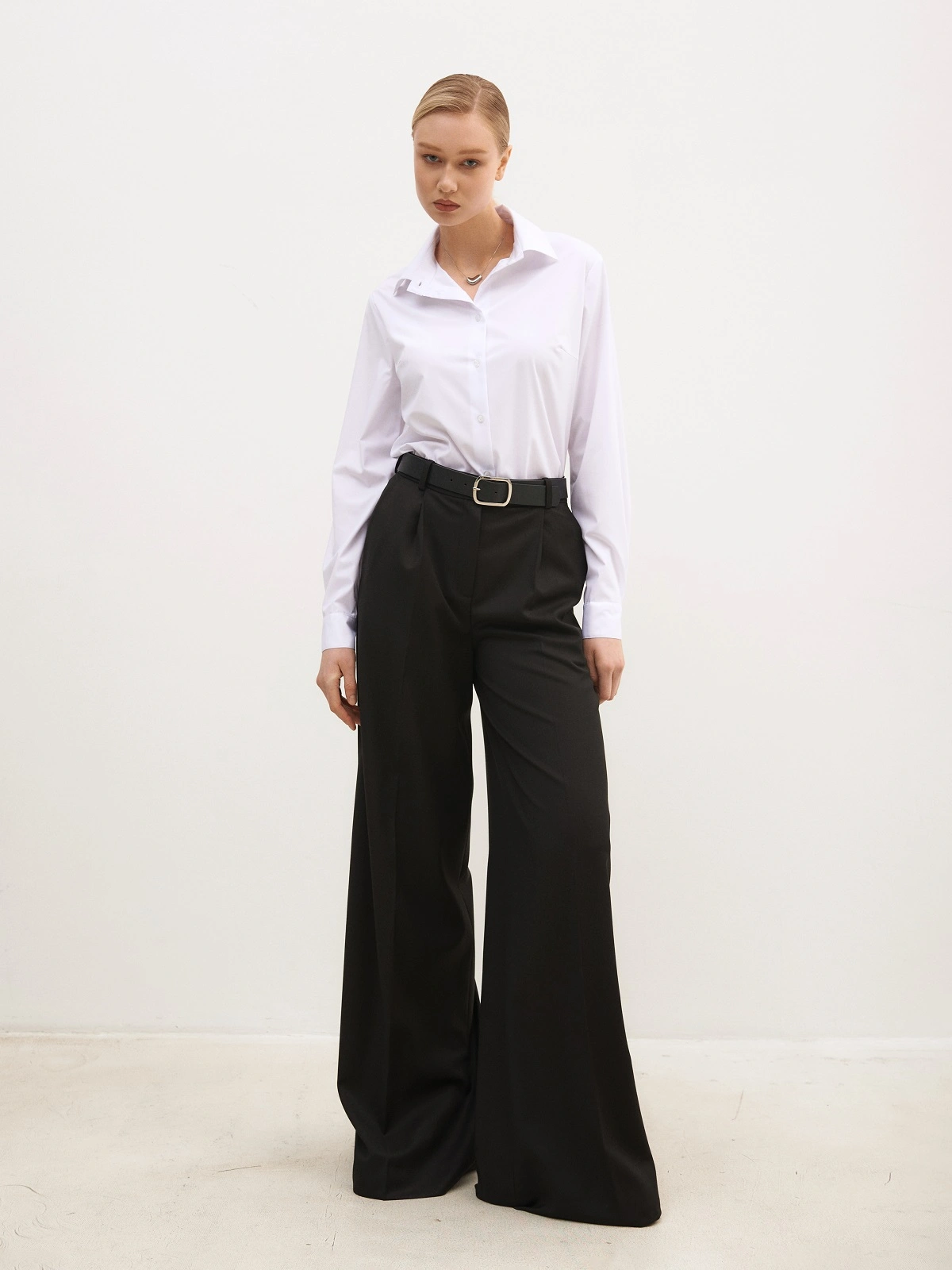 Черные брюки палаццо