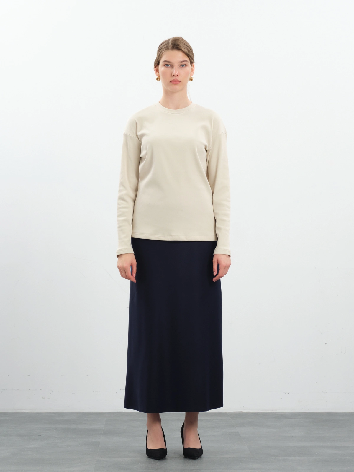 Бежевый утепленный лонгслив в рубчик