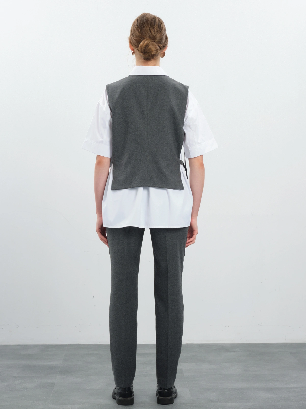 Жилет с поясами на кольцах