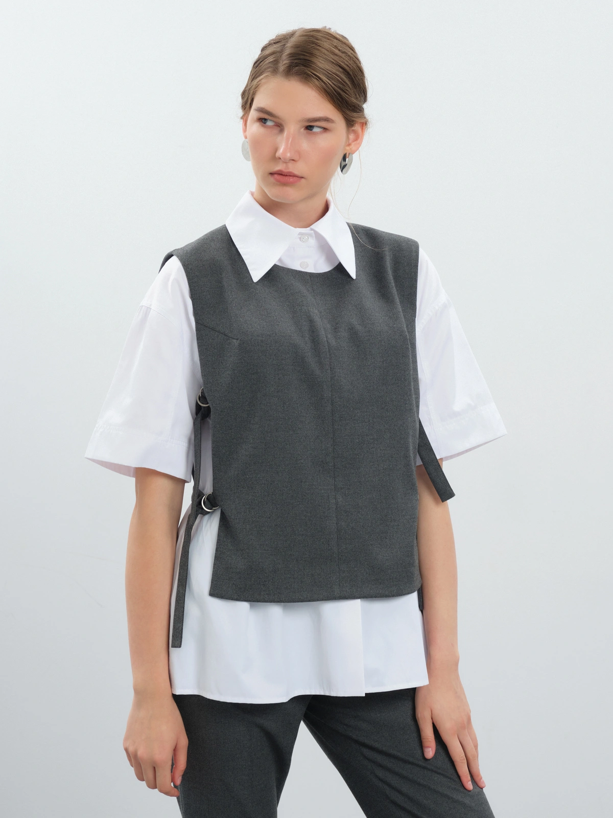 Жилет с поясами на кольцах