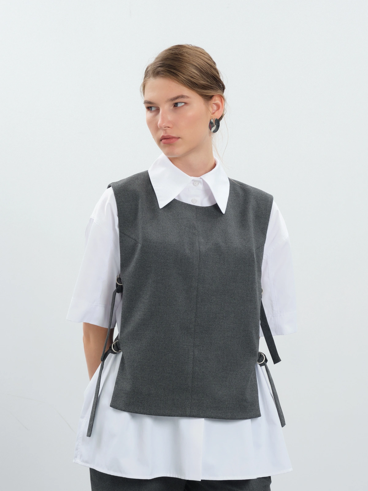 Жилет с поясами на кольцах