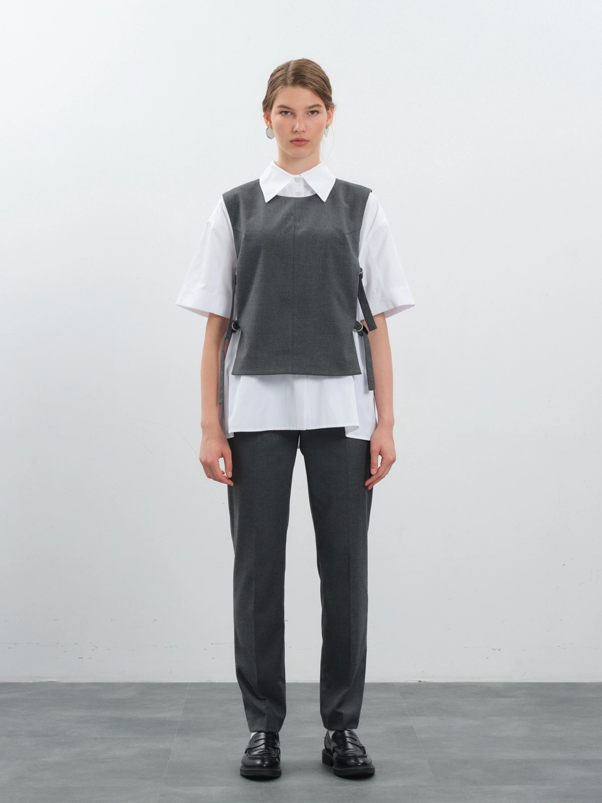 Жилет с поясами на кольцах