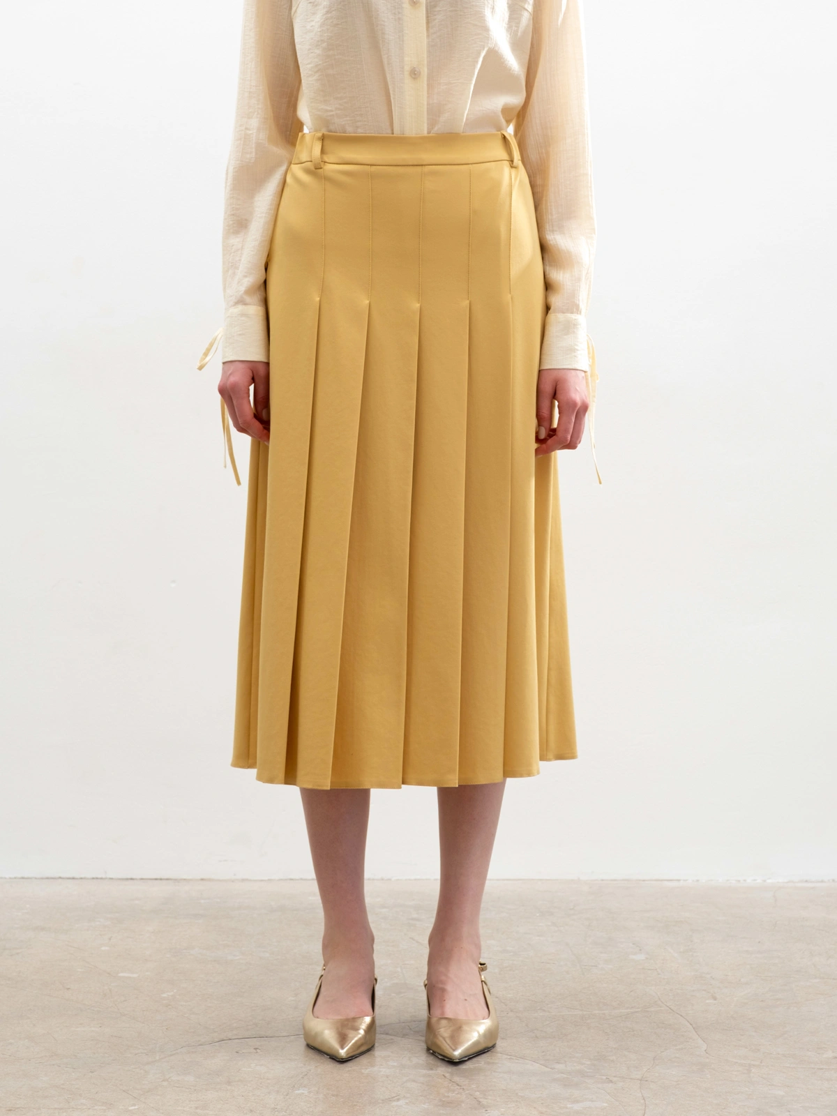 Горчичная юбка в складку