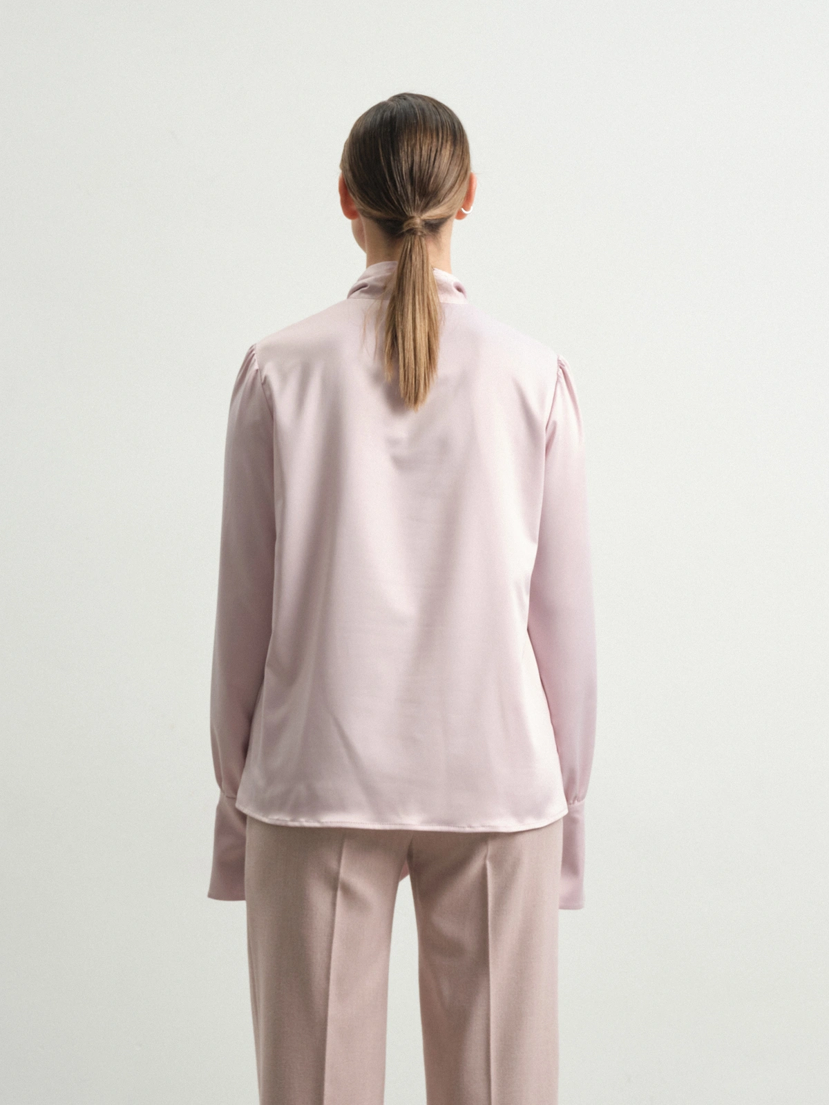 Розовая блуза с бантом Eranthis