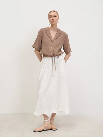 Белая юбка с фигурным низом