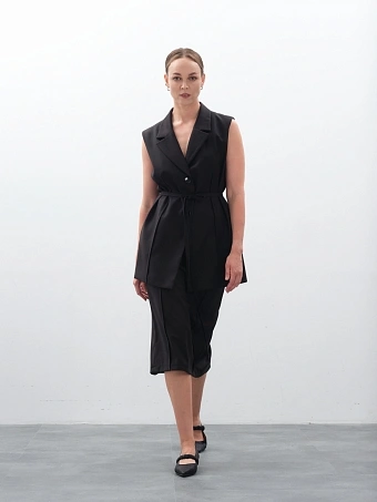 Классическая черная юбка-карандаш — незаменимая вещь в гардеробе. Эта юбка миди прямого кроя с высокой посадкой идеально подчеркивает фигуру. Лучший выбор как офисная юбка для создания строгого делового образа. Если вы хотите купить юбку, которая всегда будет актуальна, эта классическая модель — то, что нужно. Доступна доставка с примеркой и оплатой при получении. Ждем вас в наших магазинах в Перми, Екатеринбурге и Москве.