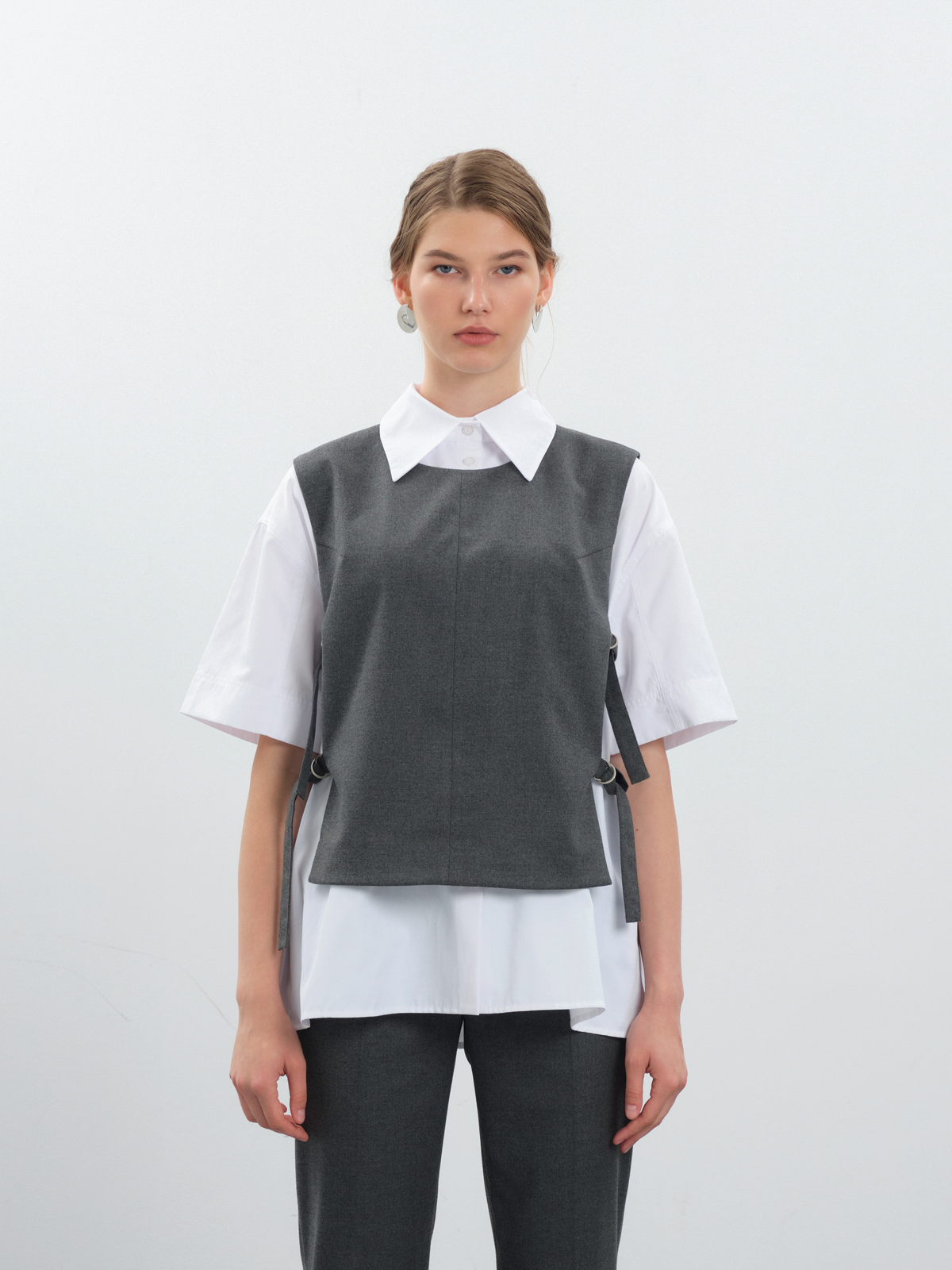 Жилет с поясами на кольцах