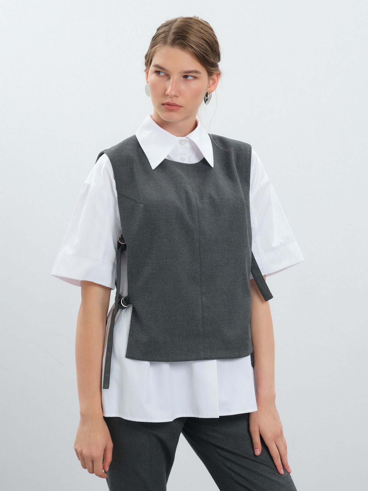 Жилет с поясами на кольцах