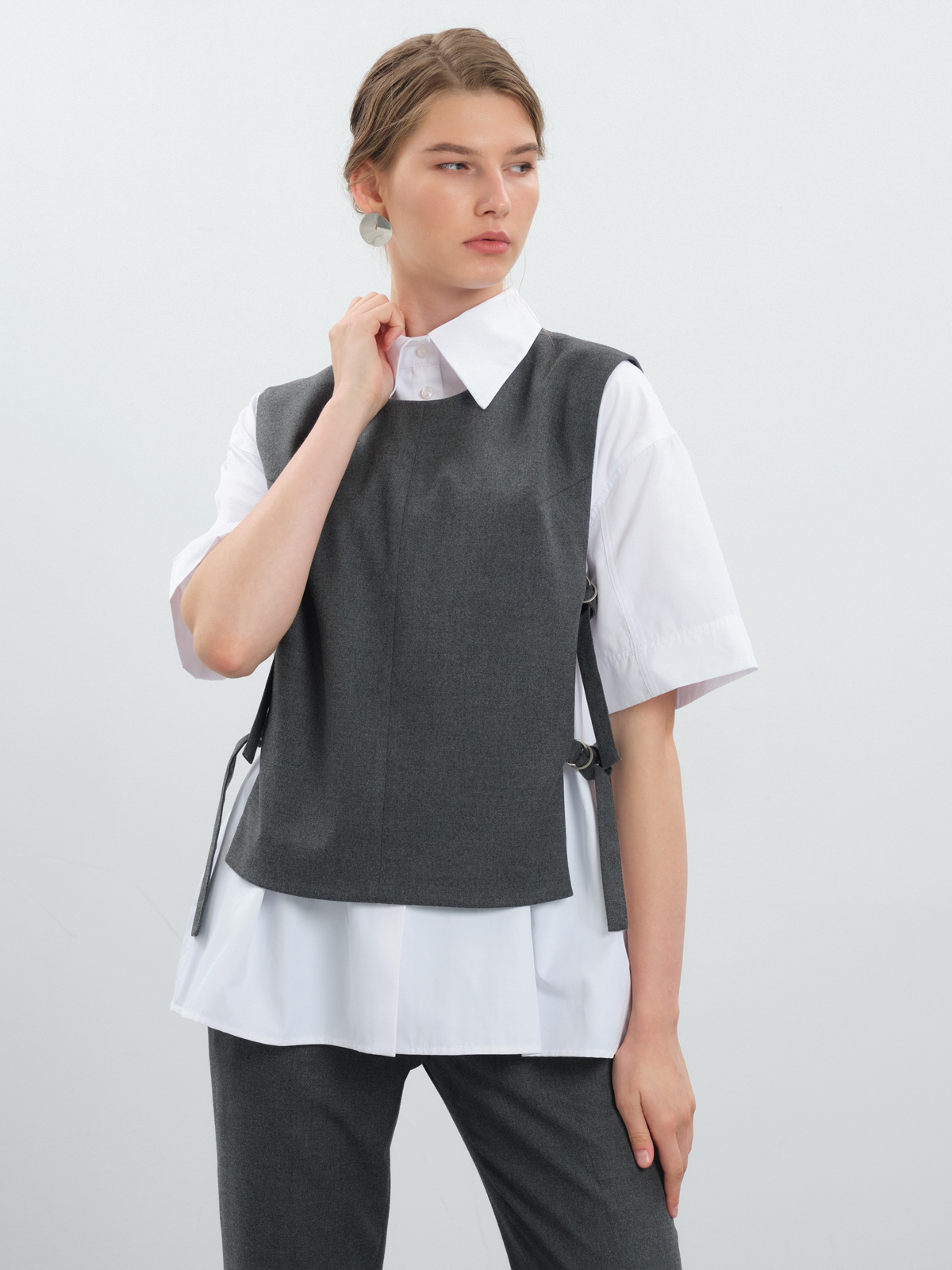 Жилет с поясами на кольцах