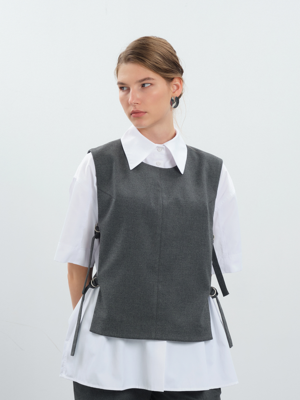 Жилет с поясами на кольцах