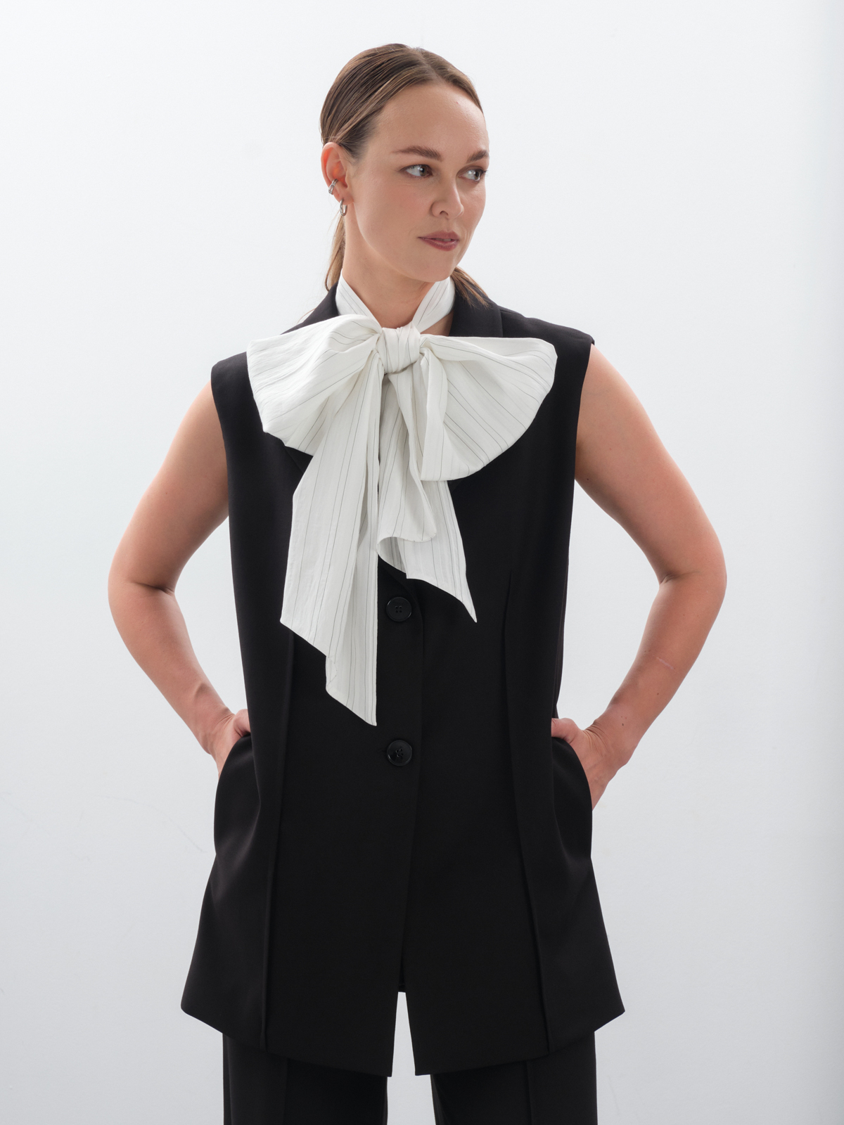жилет женский, купить жилет женский, жилет женский удлиненный, черный жилет женский, жилет женский классический, жилетка женская, жилет женский офисный, удлиненный жилет с поясом, жилет под брюки женский, деловой жилет женский, жилет-пиджак женский без рукавов, костюмный жилет женский, купить черный удлиненный жилет, жилет-жакет женский, с чем носить удлиненный жилет, жилет на пуговицах с воротником, жилет как третий слой в одежде, жилет женский на голое тело, жилет платье