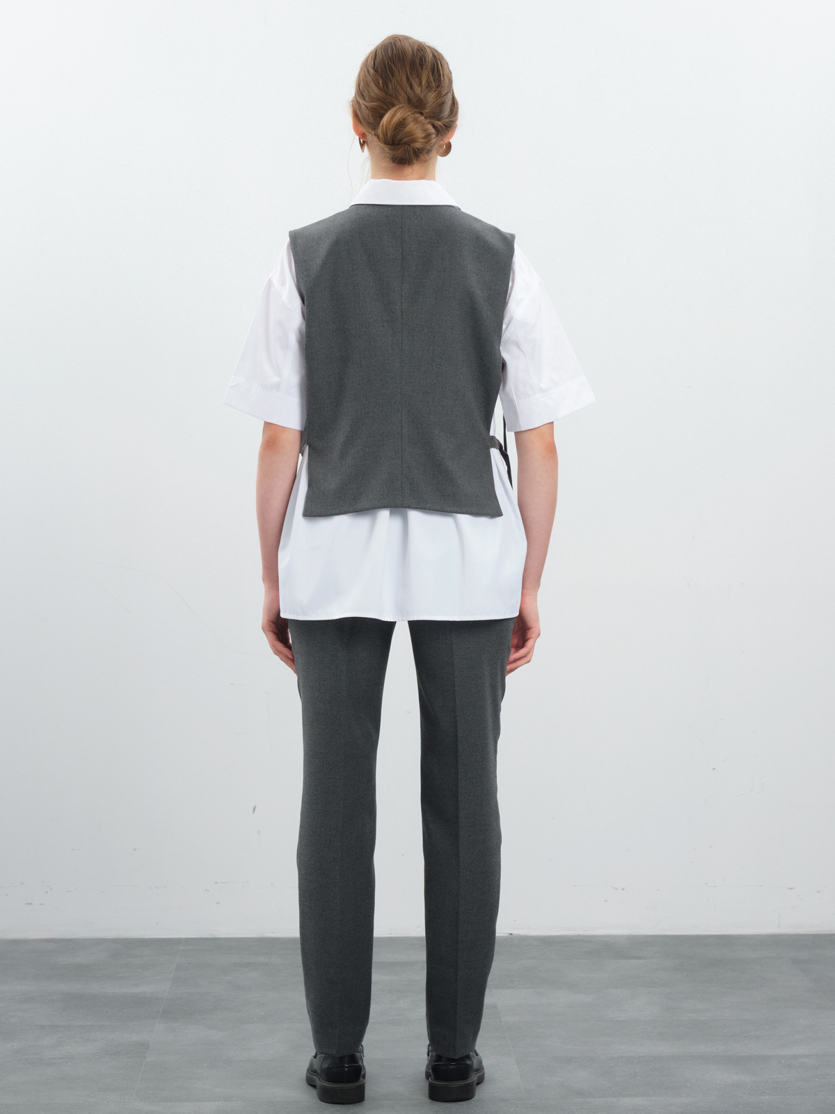 Жилет с поясами на кольцах